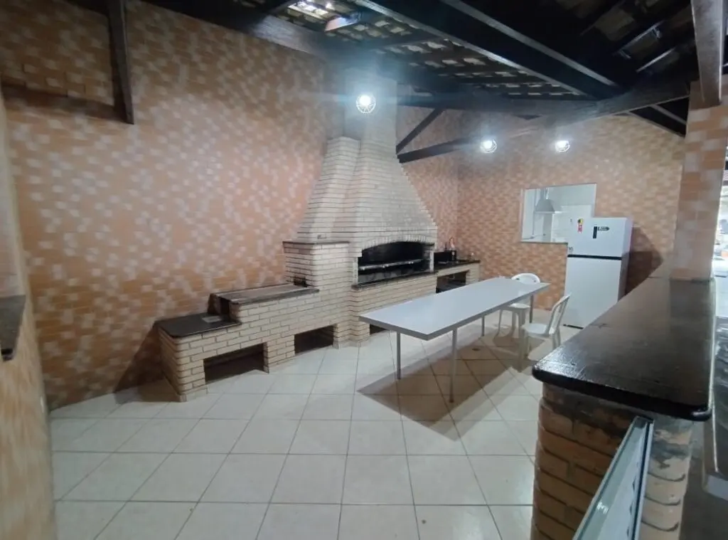 Área de churrasqueira e fogão a lenha